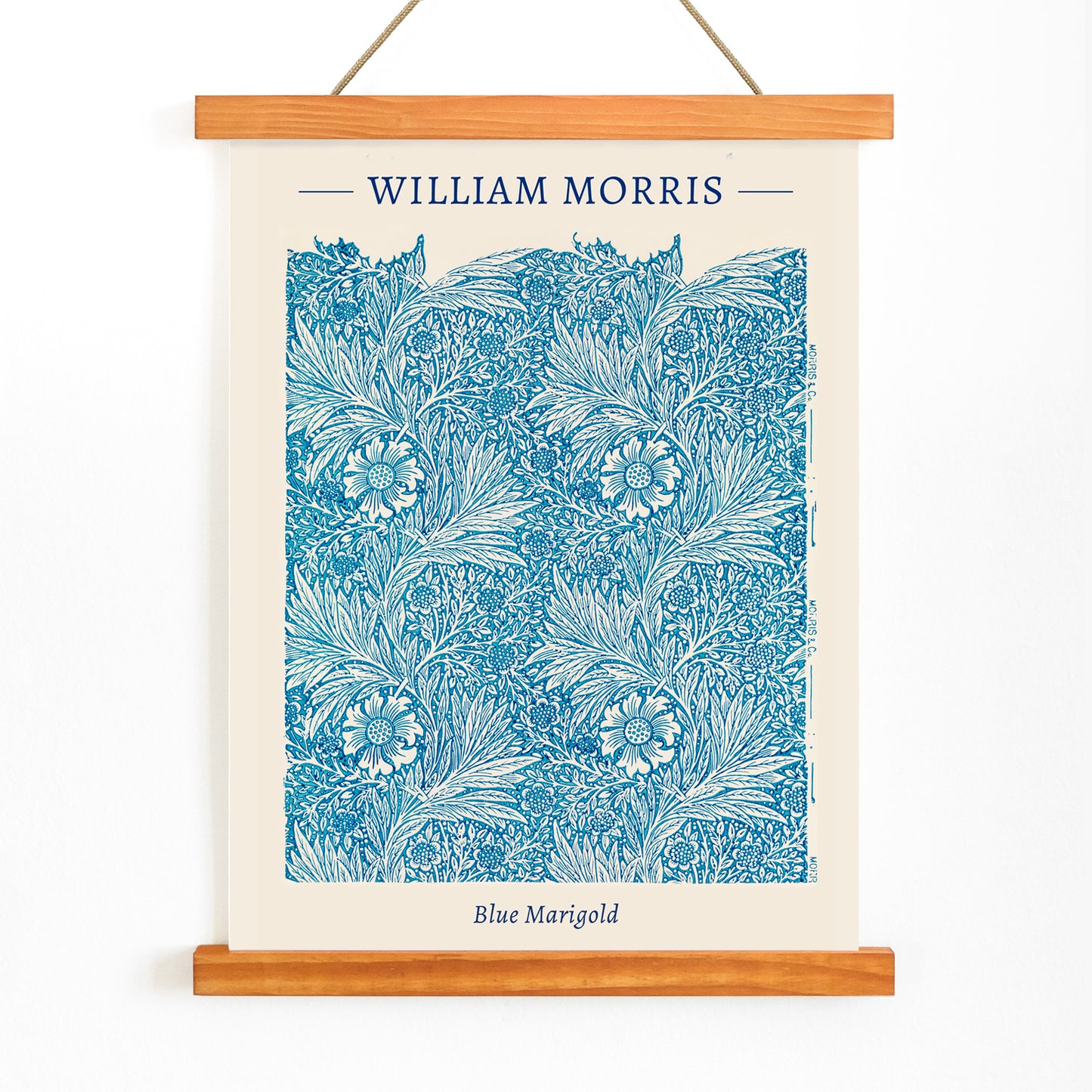 Blue Marigold illustration by William Morris featuring intricate blue floral patterns and leafy designs poster and artwork, with wooden magnetic frame on white background
