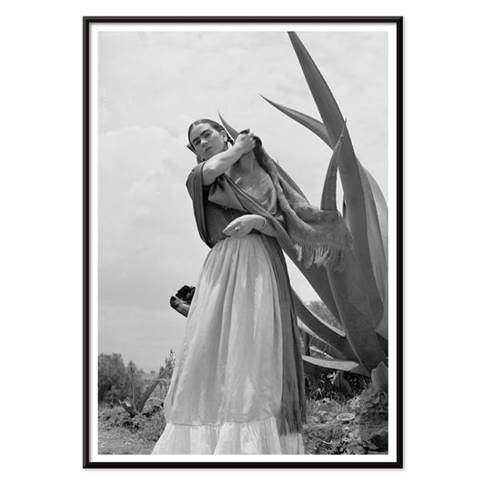 Frida Kahlo Senora Diego Rivera standing beside agave plant by Toni Frissell black and white artwork poster, with black aluminium frame on white background