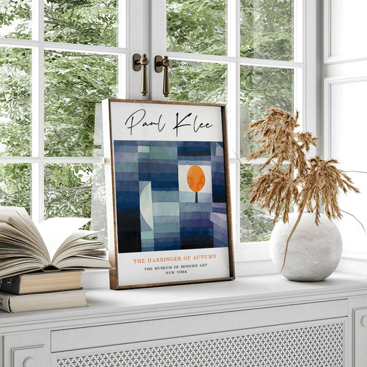Geometric abstract landscape with vibrant orange tree by Paul Klee from The Harbinger of Autumn poster for wall decor, framed and displayed in home decor