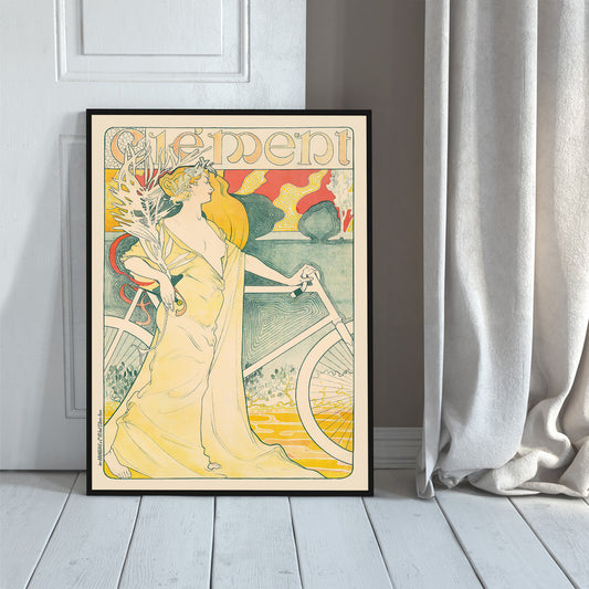 Art Nouveau poster of elegant woman in flowing gown holding bicycle by Arthur Foache Clement, framed and displayed in home decor