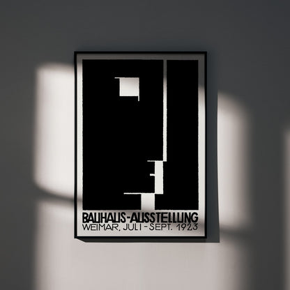 Black and white geometric abstract Bauhaus artwork by Joost Schmidt and László Moholy-Nagy featuring poster design with abstract shapes, framed and displayed in home decor