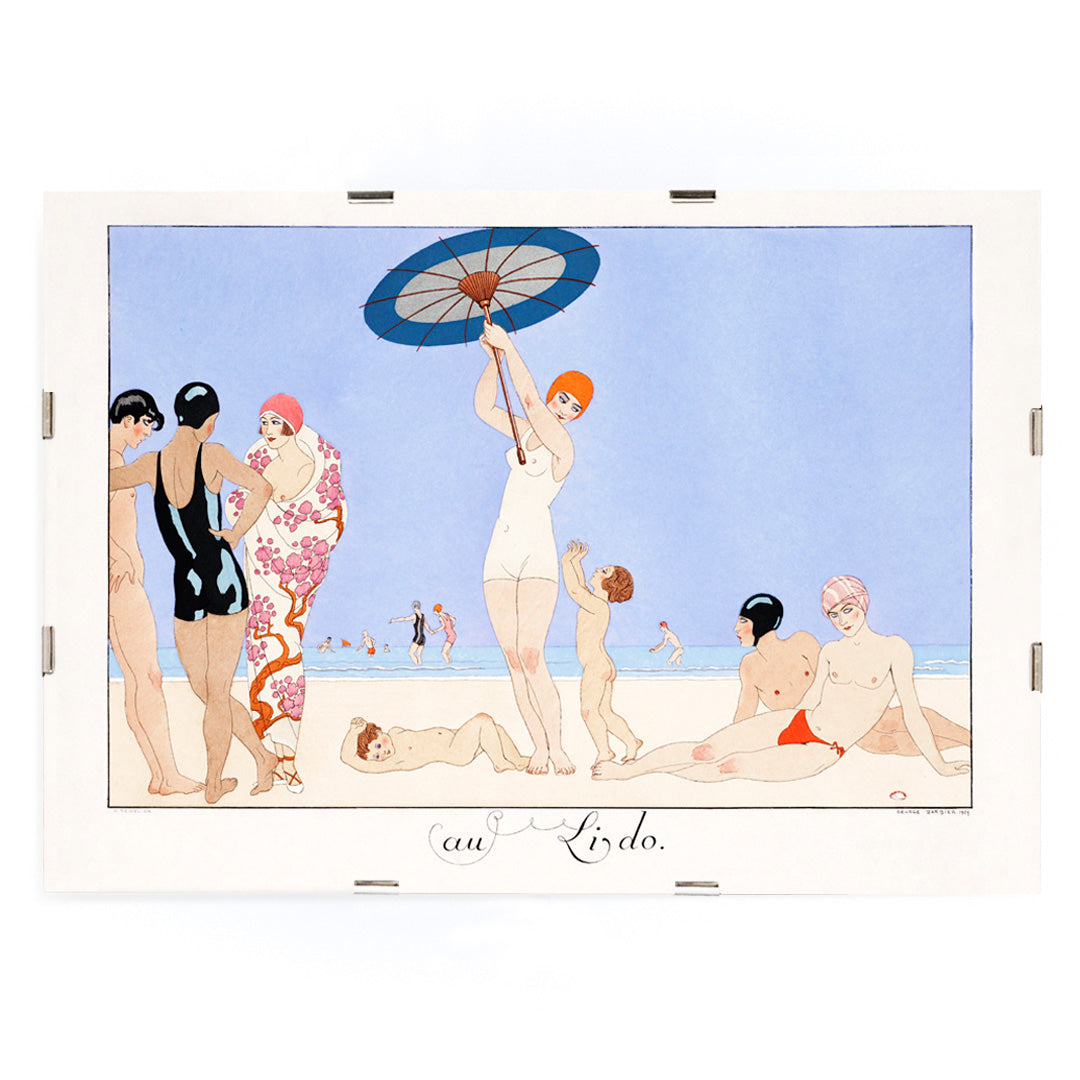 Art Deco beach scene with women children and people in swimsuits relaxing and playing on the beach Au Lido Plate by George Barbier, framed and displayed in modern living room decor