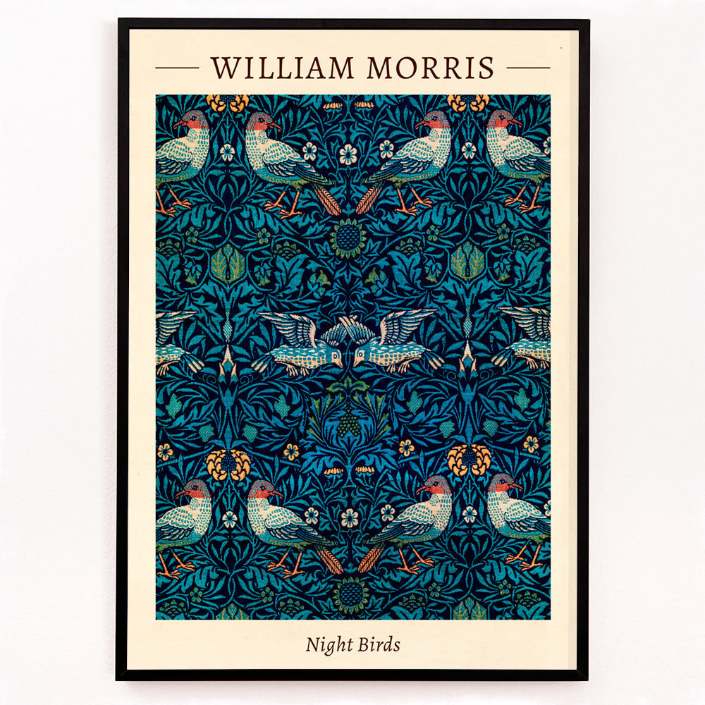 Closeup detail of Night Birds by William Morris colorful patterned illustration and poster with intricate birds and floral designs in rich blue and green tones
