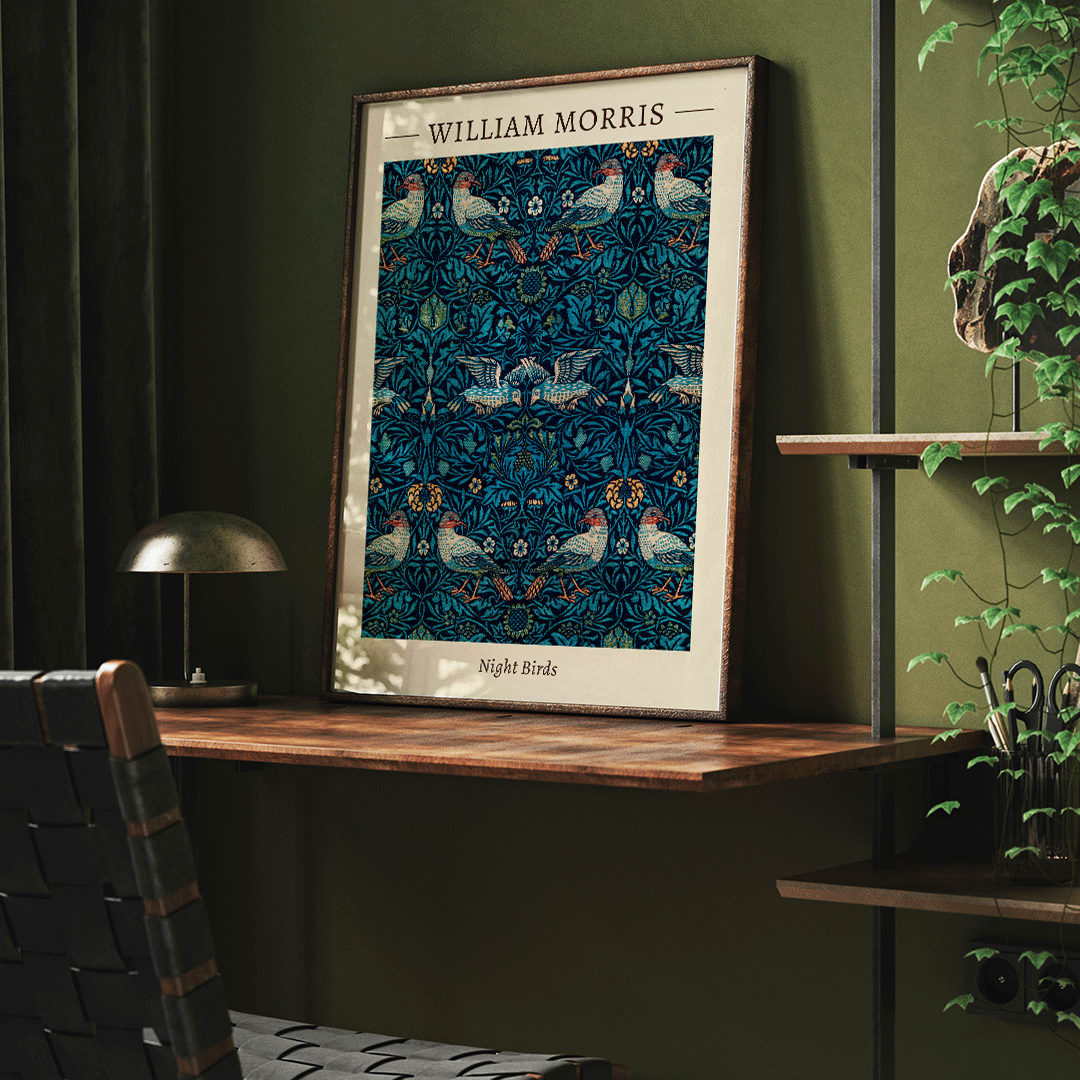 Night Birds by William Morris colorful patterned illustration and poster with intricate birds and floral designs in rich blue and green tones, framed and displayed in home decor