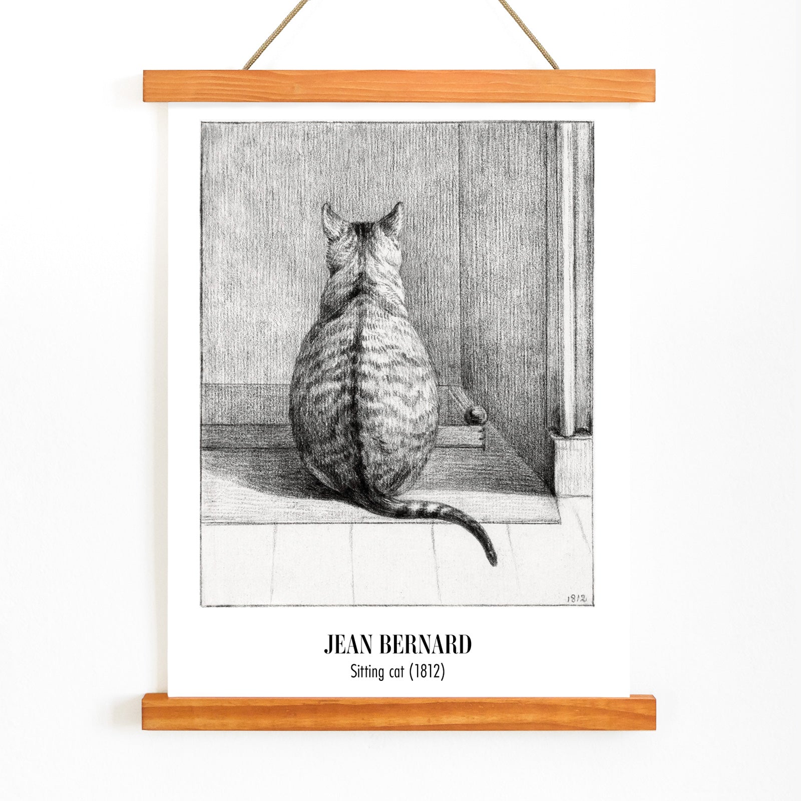 Detailed drawing poster of a sitting cat viewed from behind in a room artwork by Jean Bernard titled Sitting cat from behind, with wooden magnetic frame on white background