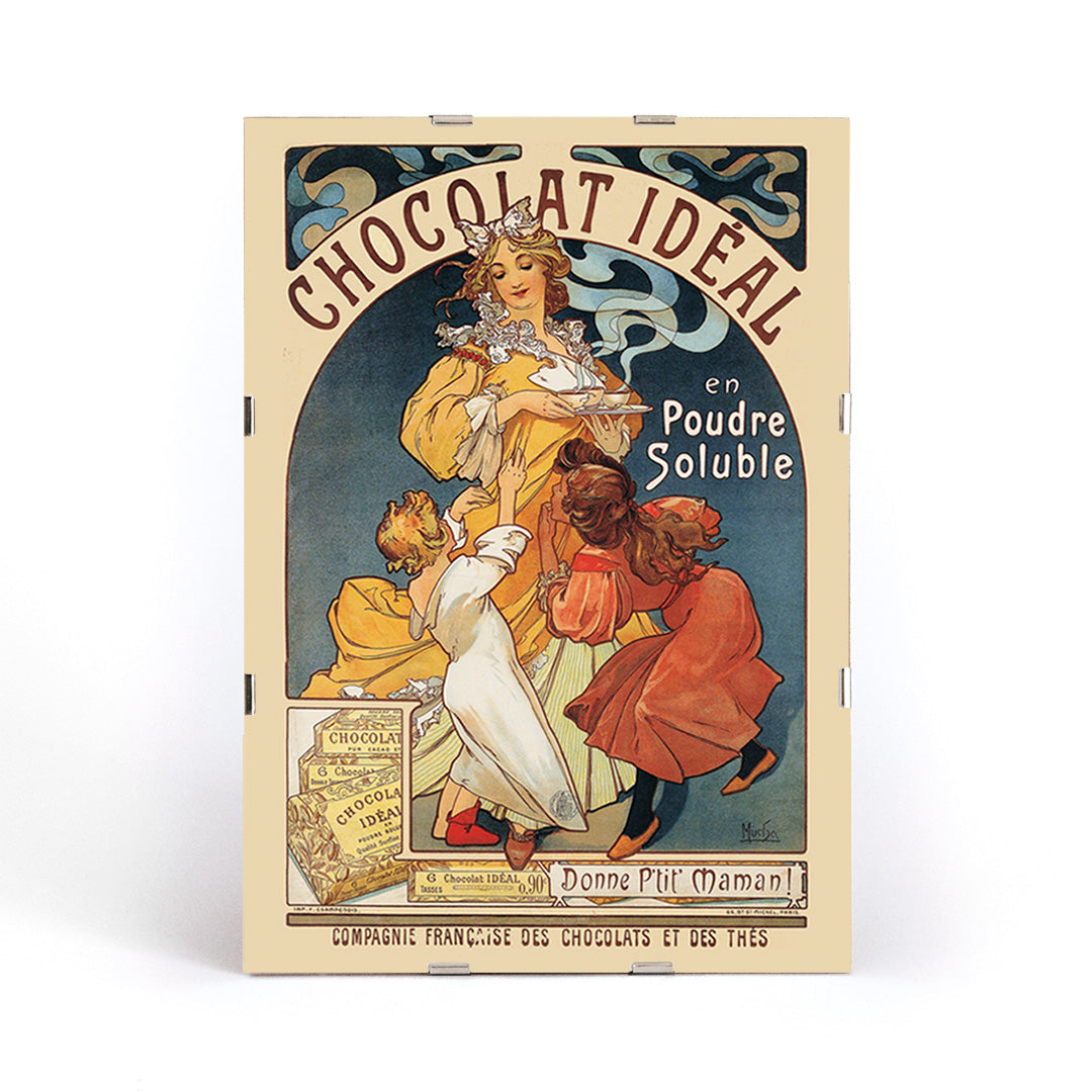 Vintage Art Nouveau poster Chocolat Ideal by Alphonse Mucha showing a woman serving hot chocolate to joyful children, framed and displayed in modern living room decor