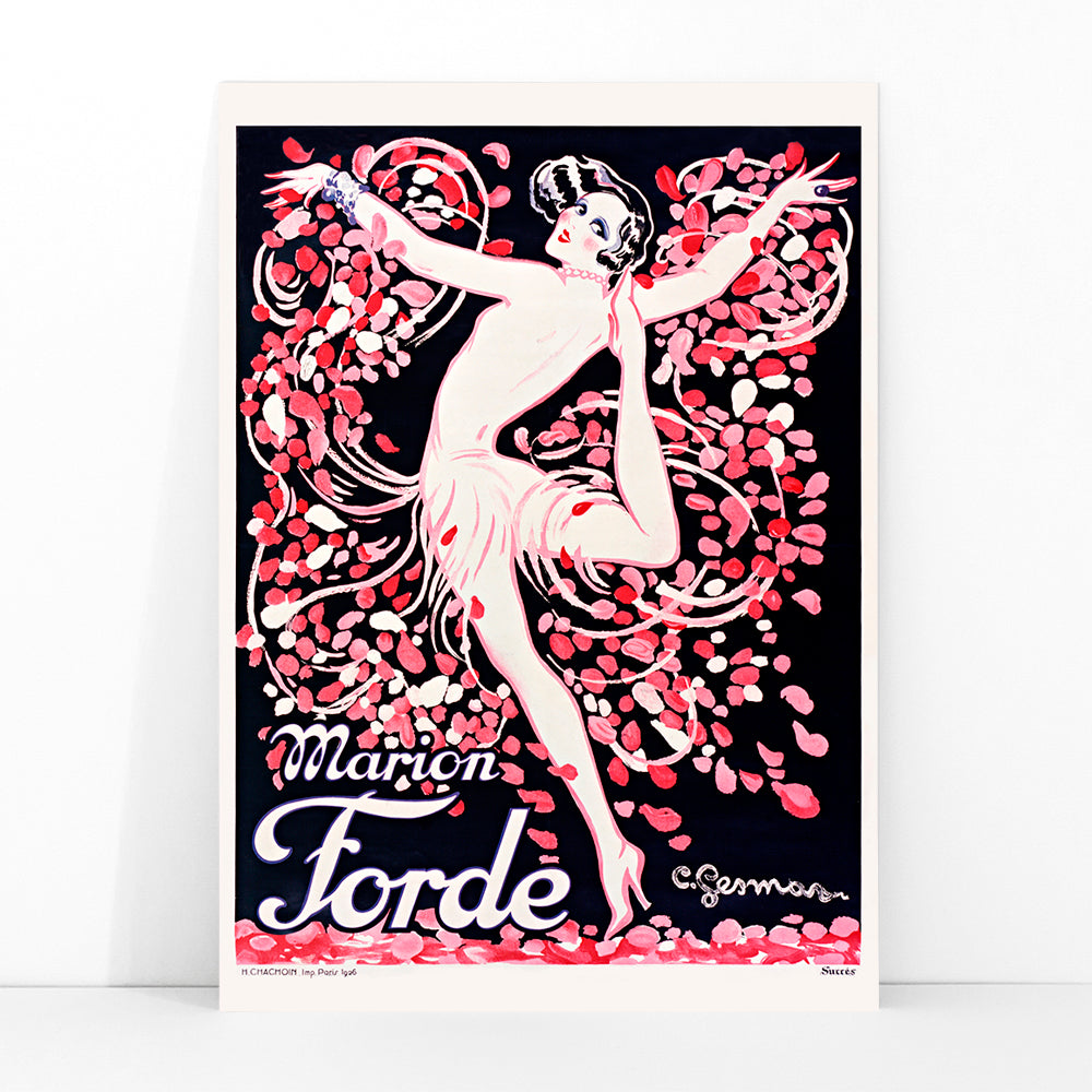 Art Deco poster of Marion Forde by Charles Gesmar featuring a dancer in a pink dress surrounded by vibrant swirling petals, framed and displayed in modern living room decor