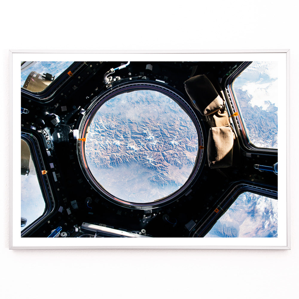 Closeup detail of Earth view from International Space Station cupola by NASA with planet visible below poster artwork