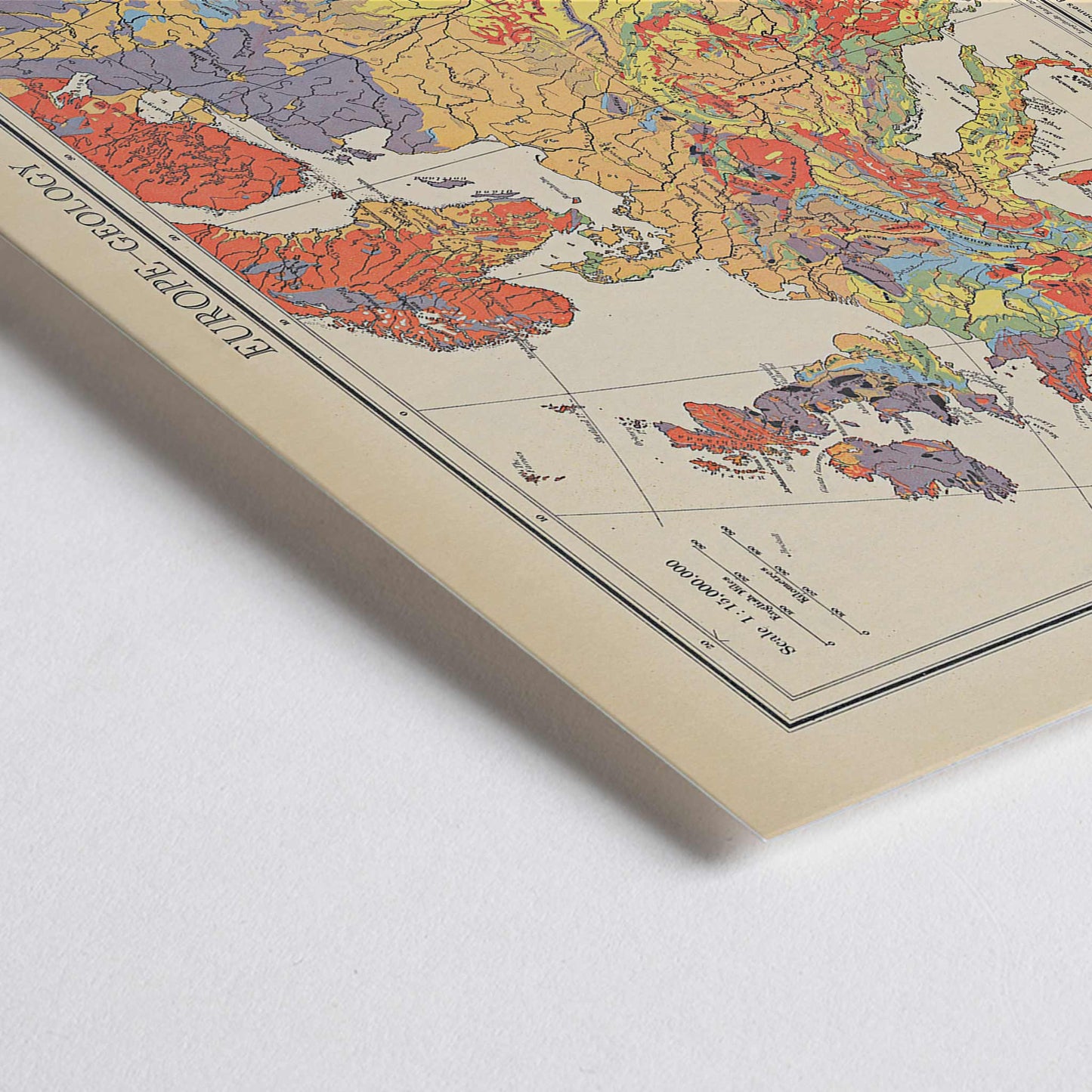 Closeup detail of John George Bartholomew Europe geology map poster with colorful geological regions in vintage scientific style