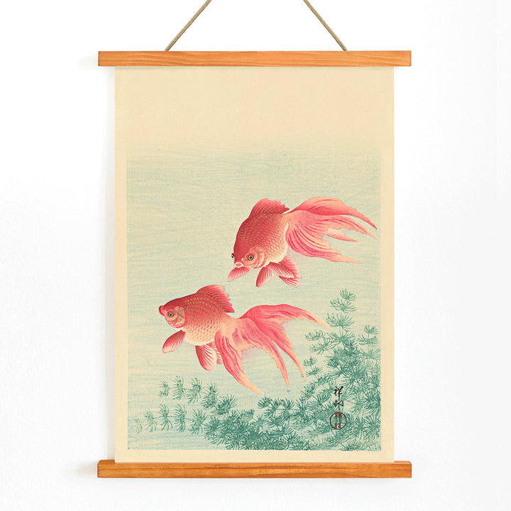 Two Goldfishes by Ohara Koson poster with two vibrant goldfish swimming among aquatic plants in blue water, with wooden magnetic frame on white background