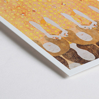 Closeup detail of Beethoven Frieze by Gustav Klimt featuring women in flowing yellow gowns with intricate golden and orange patterns and faceless figures