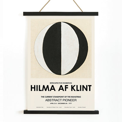 Abstract artwork The Current Standpoint of the Mahatmas by Hilma Af Klint featuring geometric shapes and a black and white abstract circular design poster, with wooden magnetic frame on white background