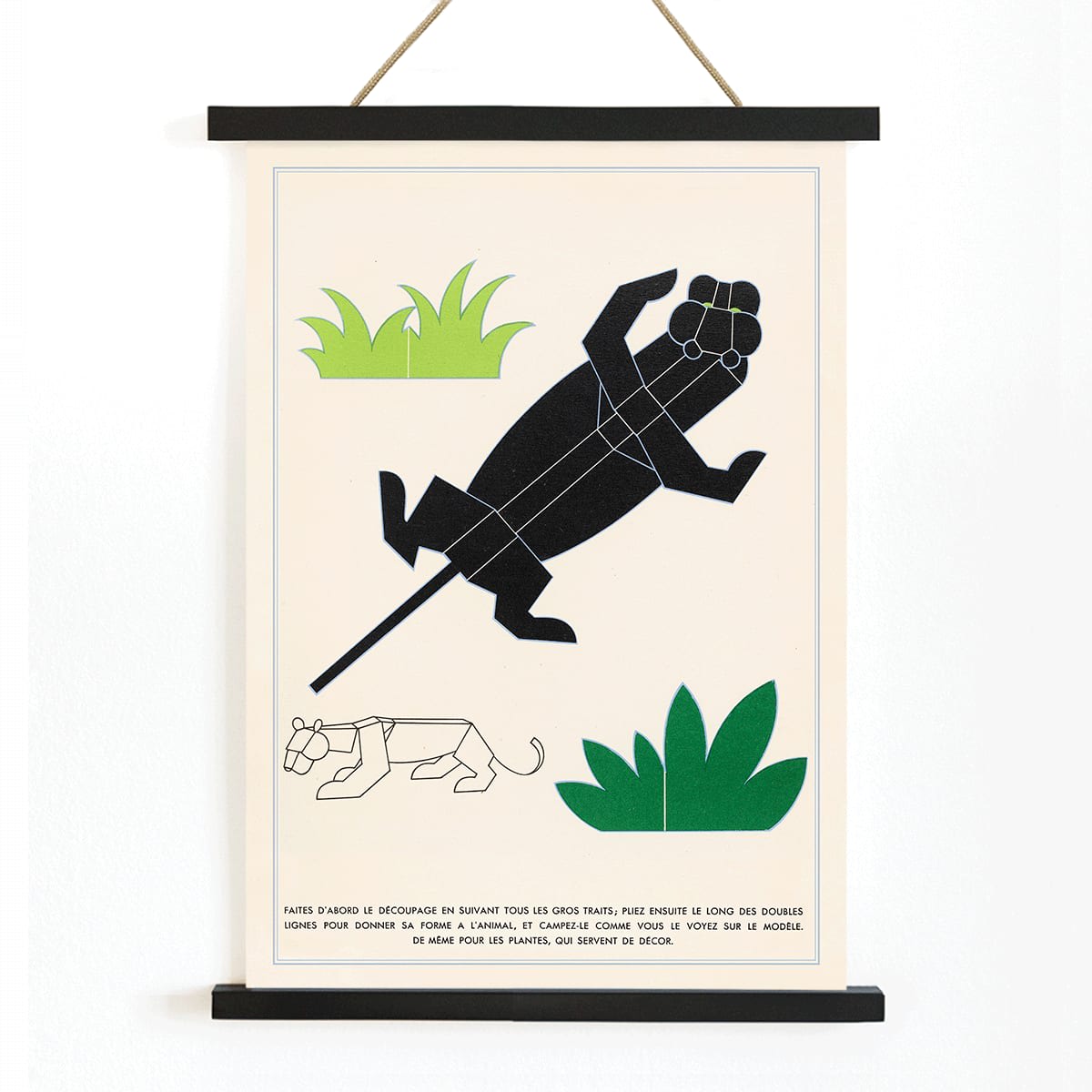 Geometric animal illustrations and poster with plants and geometric shapes forming jungle animals in La Jungle chez moi Pl 04 by Turenne Chevallereau, with wooden magnetic frame on white background