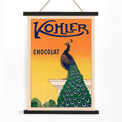 Kohler Chocolat art nouveau poster by F Champenois with vibrant peacock on pedestal against orange background, with wooden magnetic frame on white background