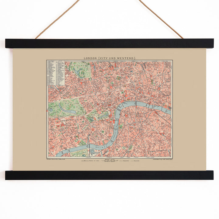 Ancient map of London by Bibliographic institute of Liepzig showing detailed vintage city streets river Thames and parks, with wooden magnetic frame on white background