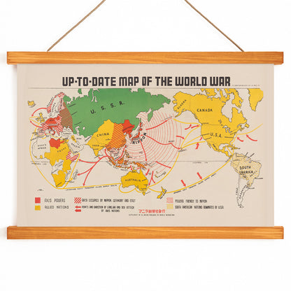 Colorful illustrated world war map showing Axis and Allied powers and marked war zones by Manila Shinbun-sha up-to-date map of the world war, with wooden magnetic frame on white background