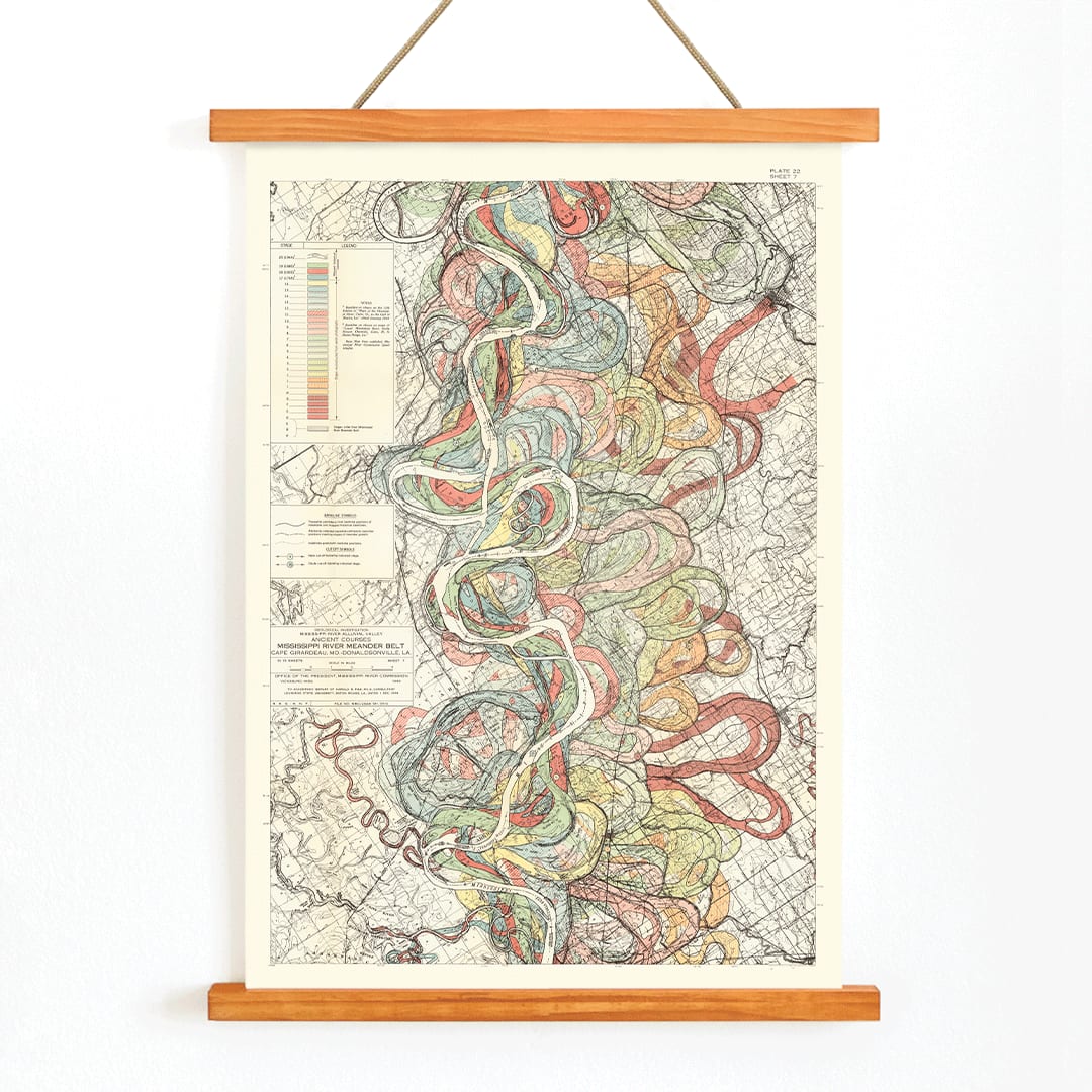 Colorful poster map of the Mississippi River by Harold Fisk titled Alluvial Valley of the Mississippi River showing historical meanders and vibrant river patterns, with wooden magnetic frame on white background