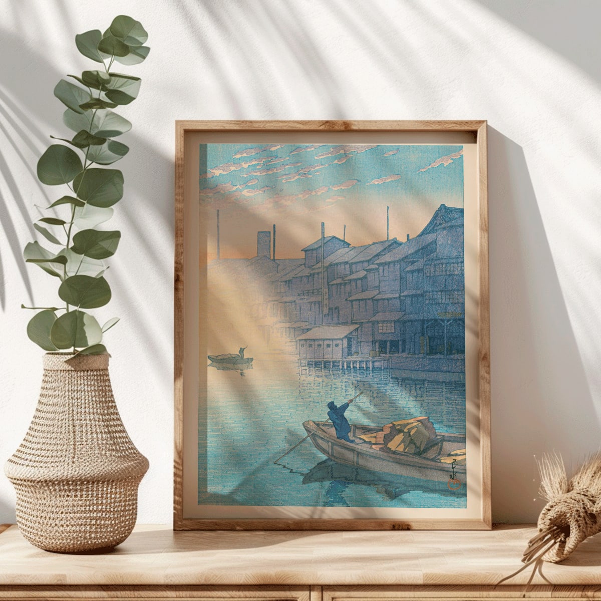 Morning at Dotonbori by Kawase Hasui serene river scene with boats and wooden houses at dawn Japanese art poster, framed and displayed in modern living room decor