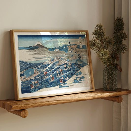 Travelers crossing a river with Mount Fuji in the background in Tokaido Kanaya no Fuji by Katsushika Hokusai poster, framed and displayed in home decor