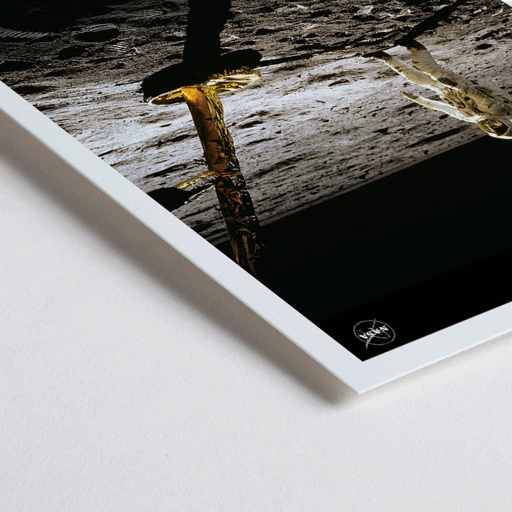 Closeup detail of Astronaut on the lunar surface with text Earths Moon Man on Moon 2 by NASA poster
