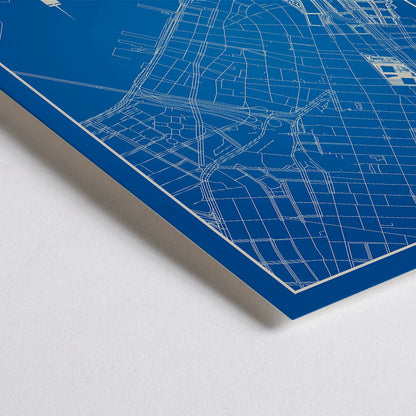 Closeup detail of New York Minimalist Map poster by artist New York featuring a blue and white outline of New York City streets above a city skyline silhouette