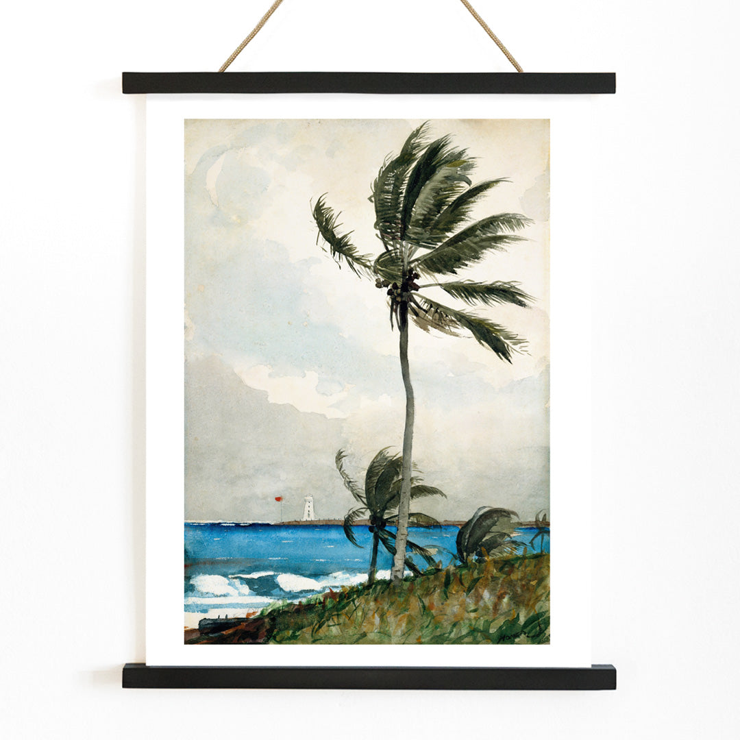 Windy tropical beach with palm trees and ocean by Winslow Homer featuring Palm Tree Nassau and lighthouse in the background, with wooden magnetic frame on white background