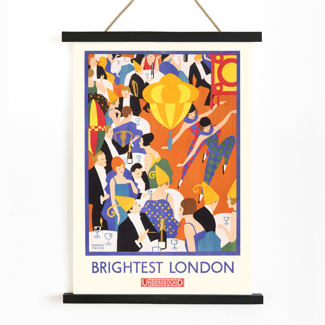 Colorful lively party scene with elegantly dressed dancing couples by Horace Taylor titled Brightest London and home by Underground poster, with wooden magnetic frame on white background