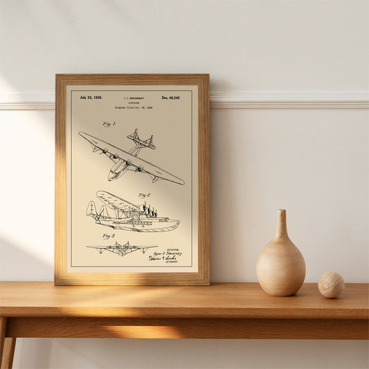 Detailed technical drawing and poster of a seaplane airplane patent by Igor I Sikorsky featuring multiple views and aircraft design sketches, framed and displayed in home decor
