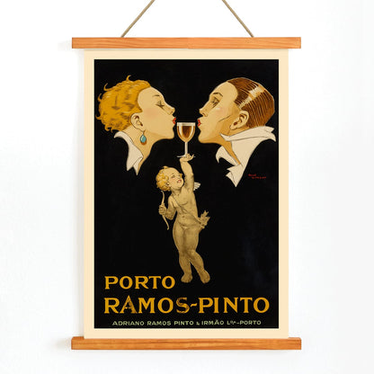 Porto Ramos-Pinto poster by Rene Vincent with two people about to kiss and a cherub holding a wine glass, with wooden magnetic frame on white background