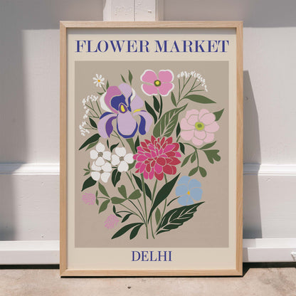 Colorful floral illustration and poster of a vibrant flower arrangement titled Flower Market Delhi by Moryarty, framed and displayed in home decor
