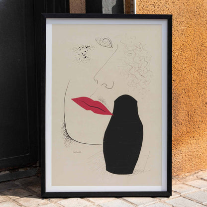 Abstract minimalist portrait with red lips and black silhouette modern art poster by Mikulas Galanda titled Desire, framed and displayed in home decor