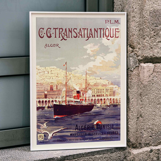 Vintage steamship in Algiers harbor with city buildings travel poster by Fernand Le Quesne Cie Cle Transatlantique, framed and displayed in home decor