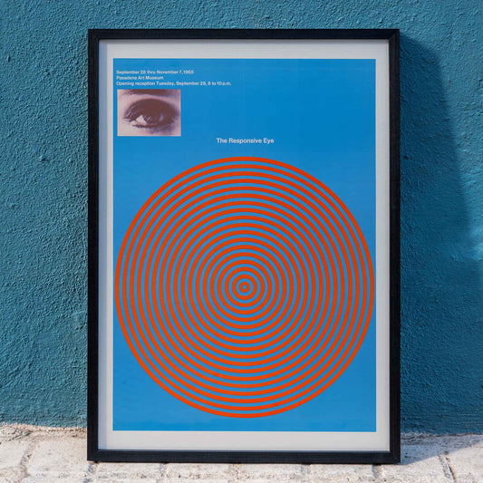 Op art poster with blue and red concentric circles and eye detail from The Responsive Eye by Patrick Blackwell, framed and displayed in home decor