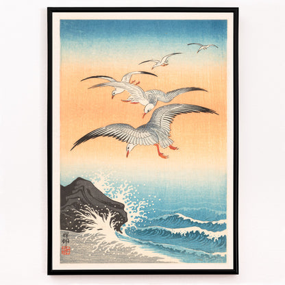 Closeup detail of Five seagulls flying over turbulent sea with waves and rocky shore artwork by Ohara Koson