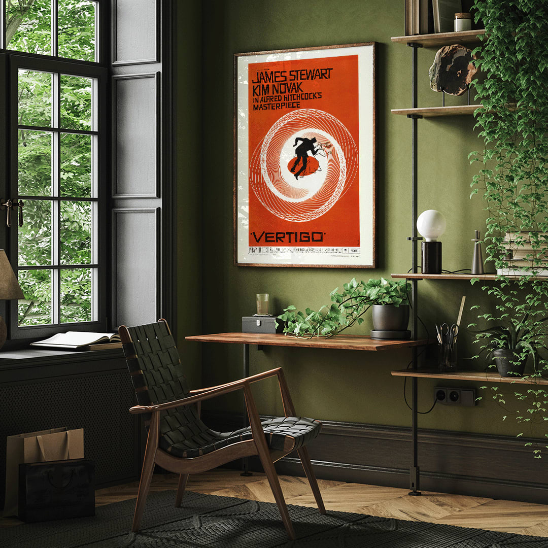 Vertigo movie poster by Saul Bass featuring vibrant orange background swirling spiral and silhouetted figures graphic design, framed and displayed in home decor