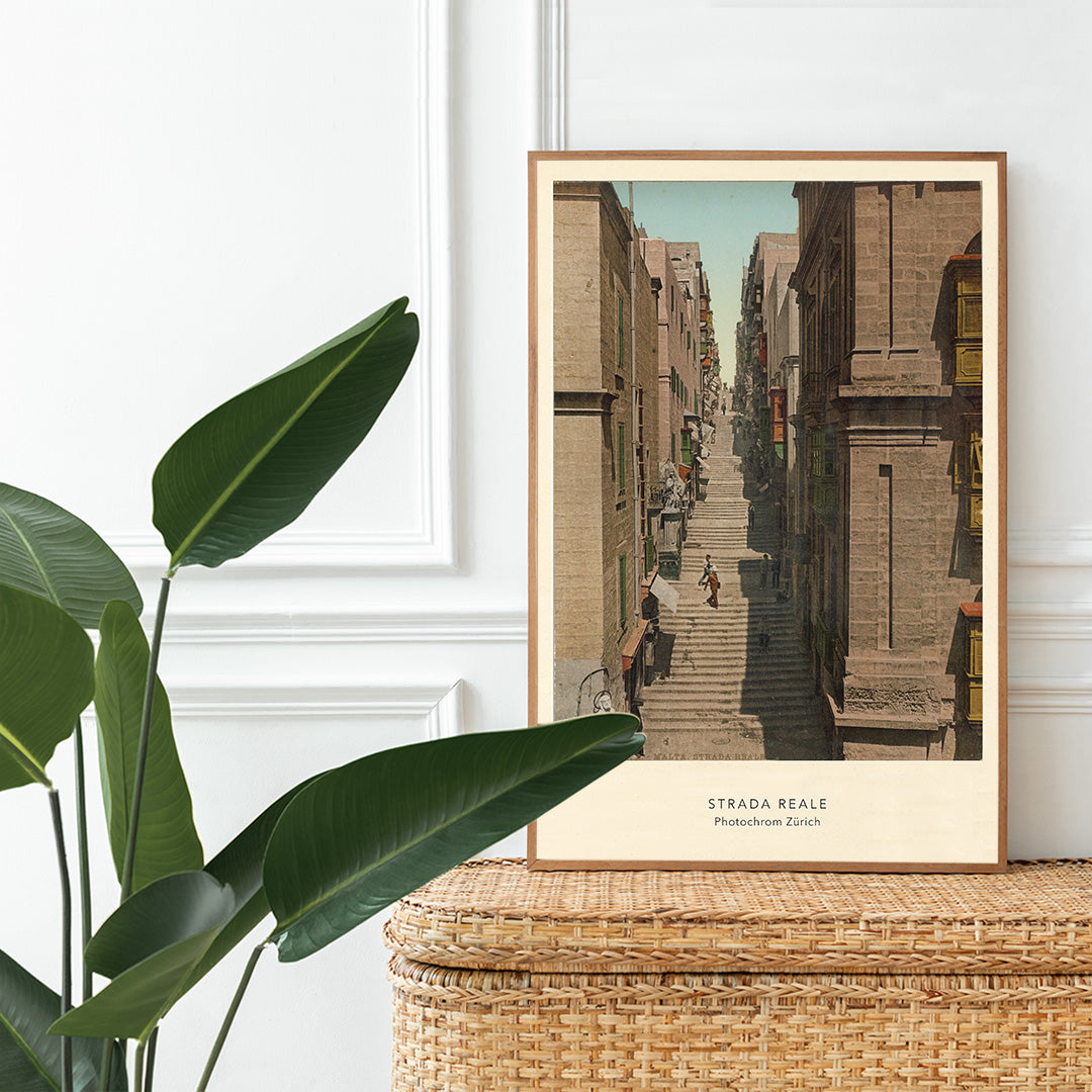 Steep stone staircase and historic street scene with people in Valletta Strada Reale by Photochrom Zurich, framed and displayed in home decor