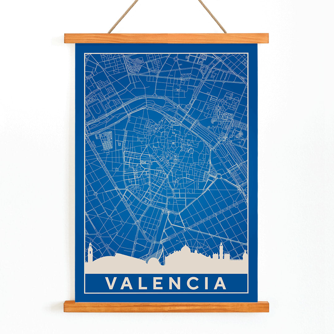 Minimalist Valencia Map poster by artist Minimalist featuring a detailed blue and white city map and skyline, with wooden magnetic frame on white background